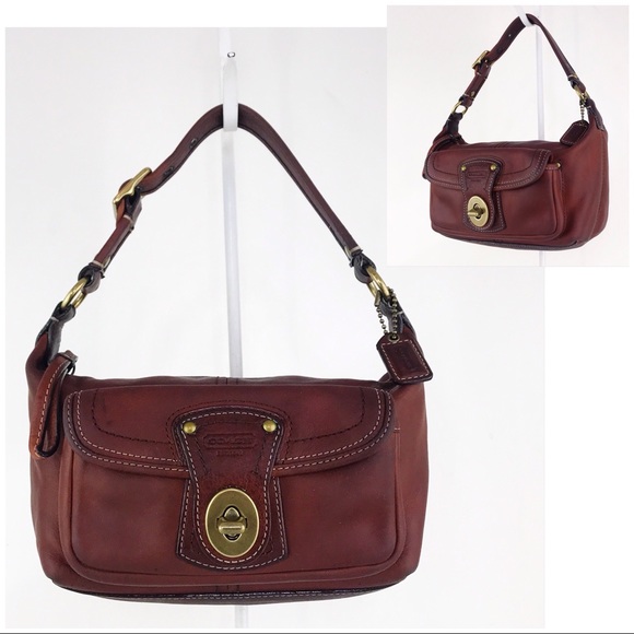Coach Handbags - Coach Whiskey Vachetta Leather Turnlock Baguette